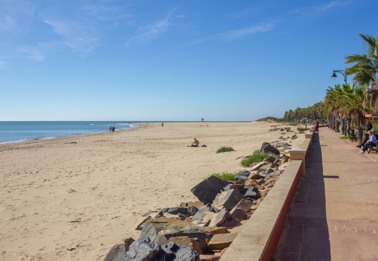 Appartement à Isla Canela - Appartement avec piscine à 10 m de la plage