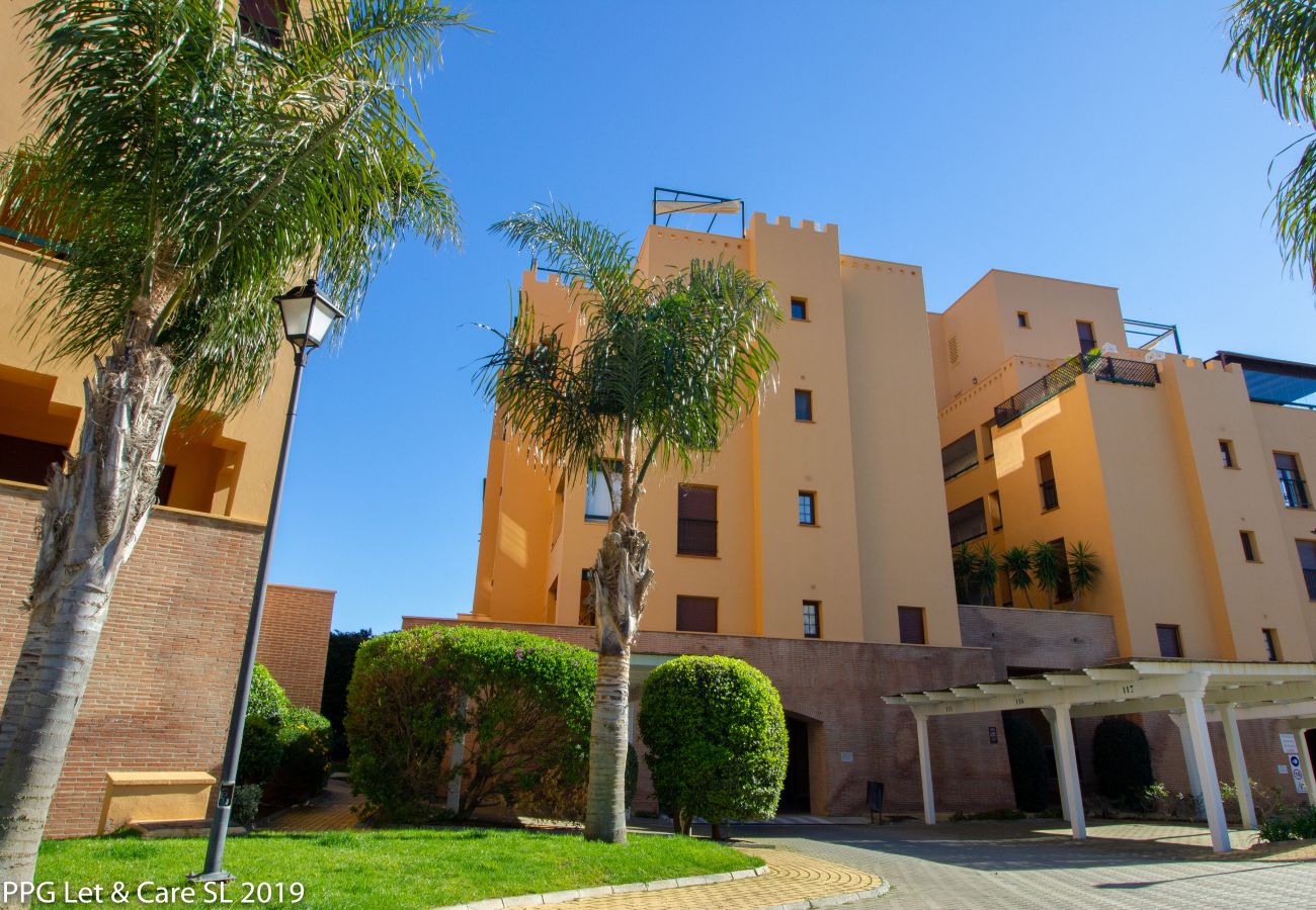 Appartement à Isla Canela - Appartement avec piscine à 10 m de la plage