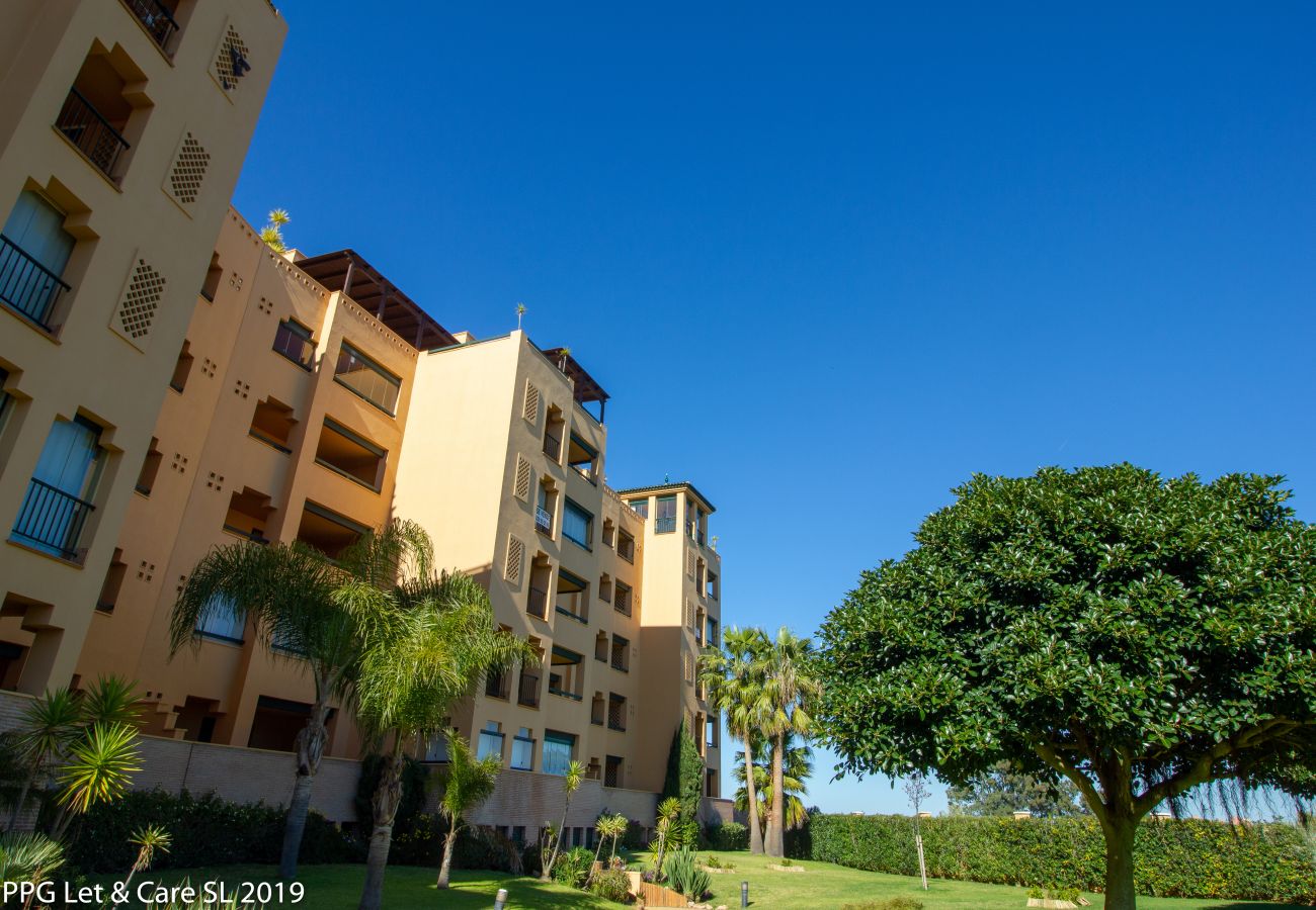 Appartement à Isla Canela - Appartement avec piscine à 10 m de la plage